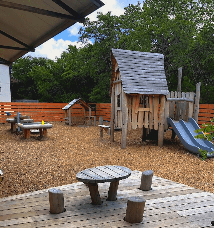 An outdoor playground with climbing structures